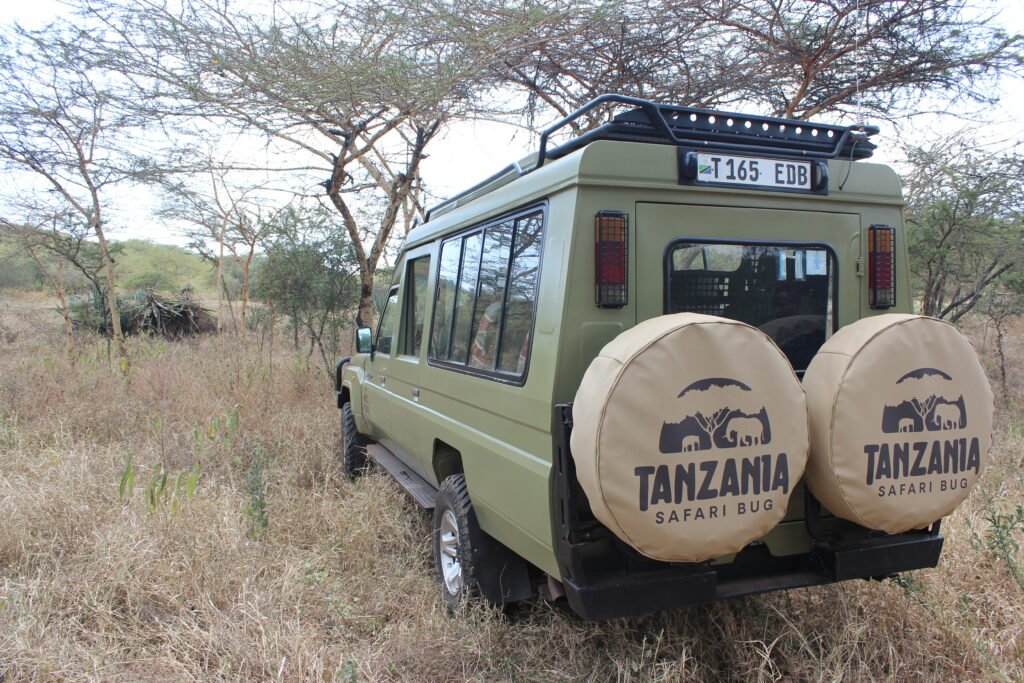 Safari vehicle in Tanzania, Africa, on a safari car adventure.