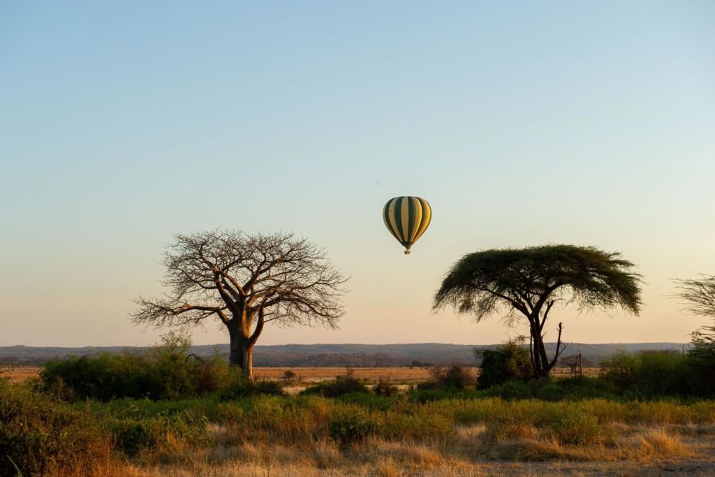 A hot air balloon over Ruaha landscape while on best safari in Tanzania.